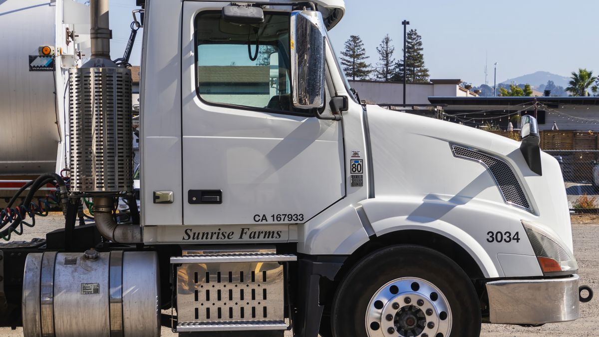 Close-up of a white semi tractor day cab